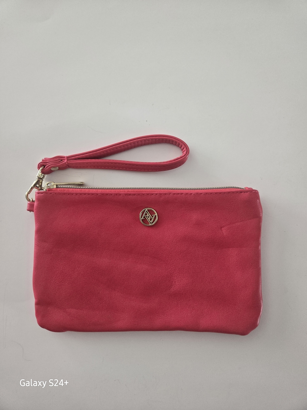 Adrienne Vittadini Coral Pink Wristlet Clutch with Gold Accent